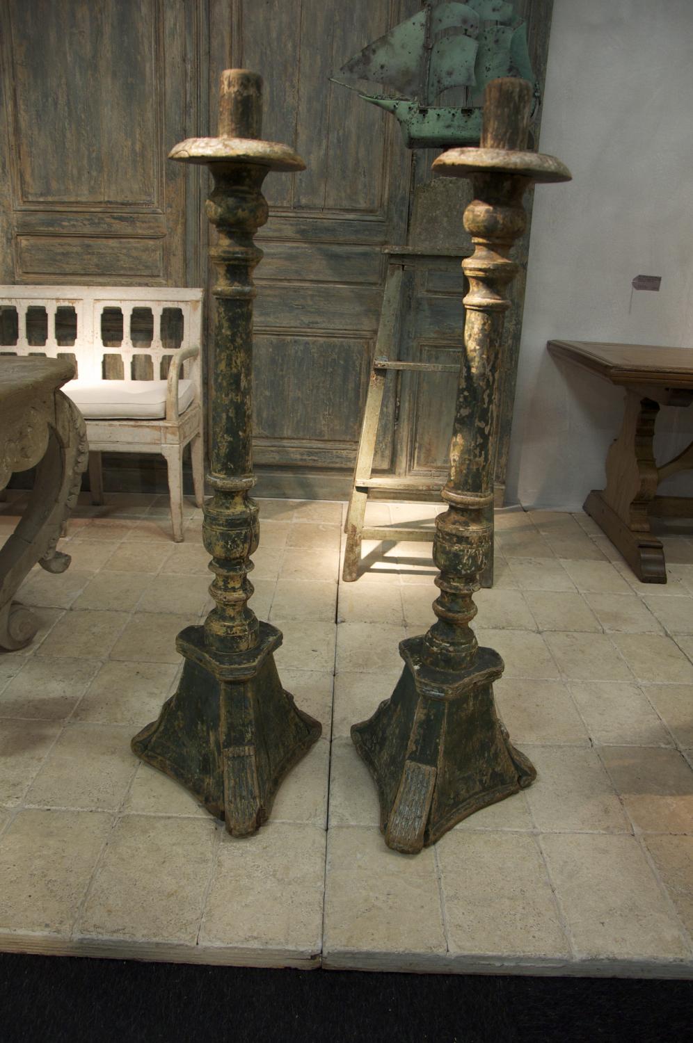 A pair of Italian 18th Century candlesticks
