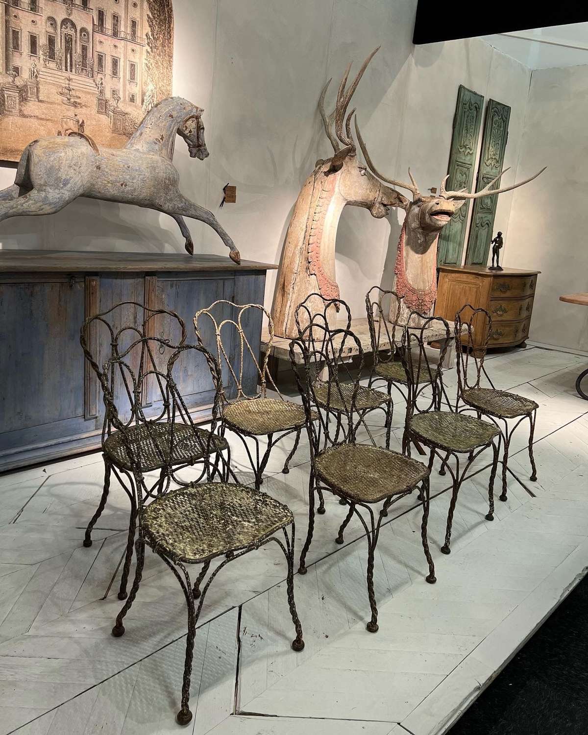 A set of 8 French Napoleon III metal chairs